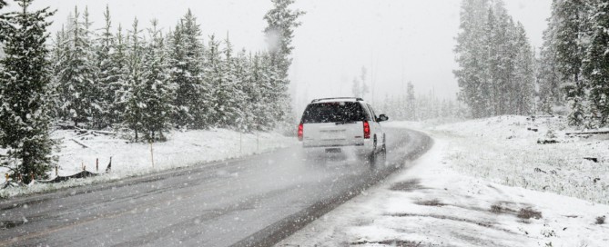 Car driving through the snow